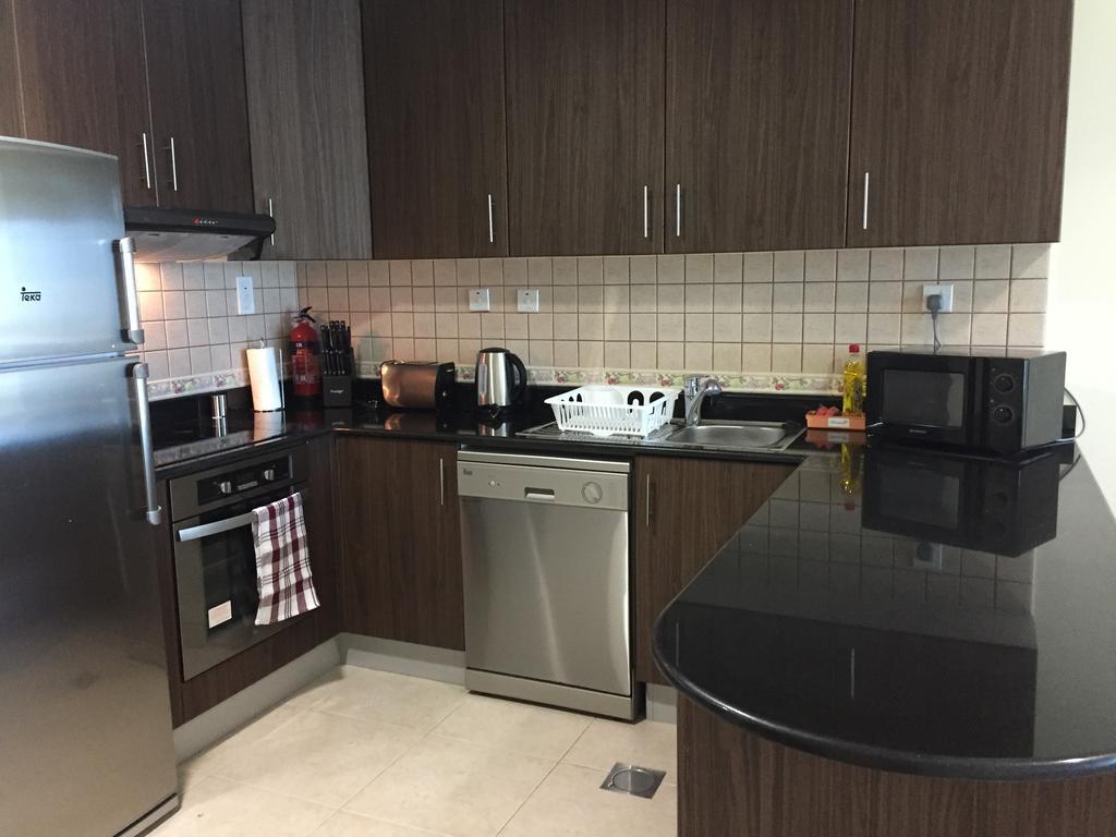 Espace Holiday Homes - Elite Residency Dubai Bagian luar foto